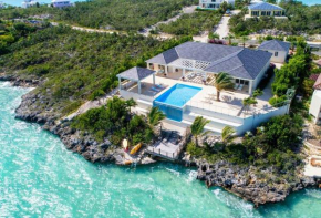 Crystal Blue Water Front Home with Pool